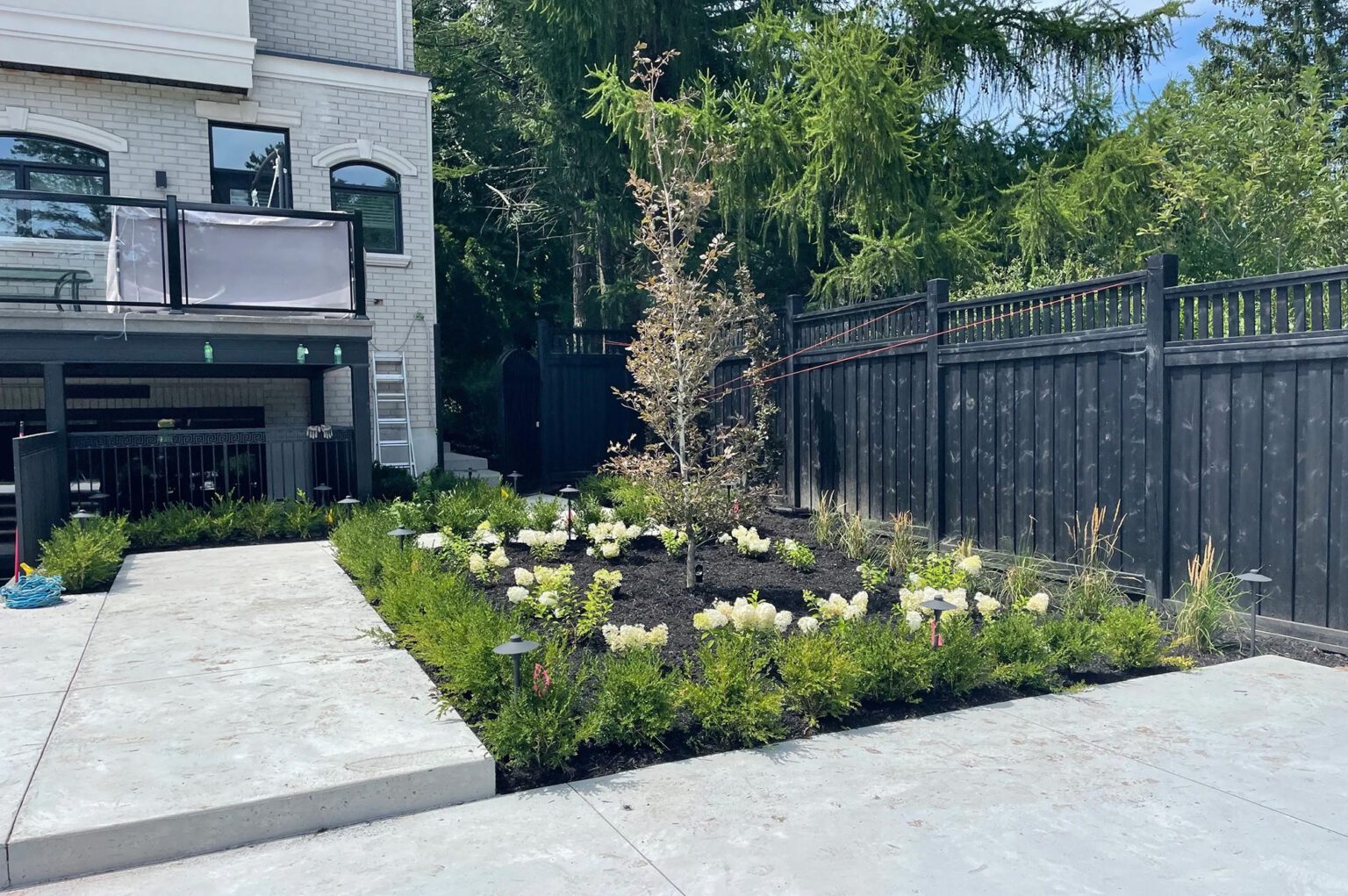 Garden bed maintenance by Gladstone Property Services in the Greater Toronto Area